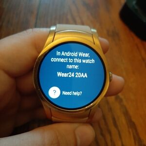 🛍Verizon Wear24 Android Smartwatch Model QTAXU1 Gold Case/Beige Band